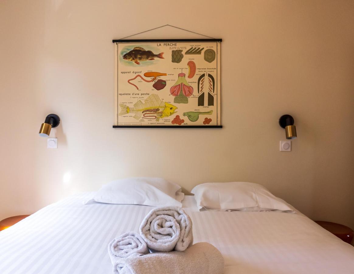 Les Nids Perches - Rue Sainte Croix Apartment มอคตาญ-โอ-แปร์ช ภายนอก รูปภาพ