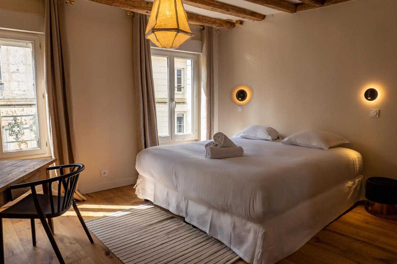Les Nids Perches - Rue Sainte Croix Apartment มอคตาญ-โอ-แปร์ช ภายนอก รูปภาพ