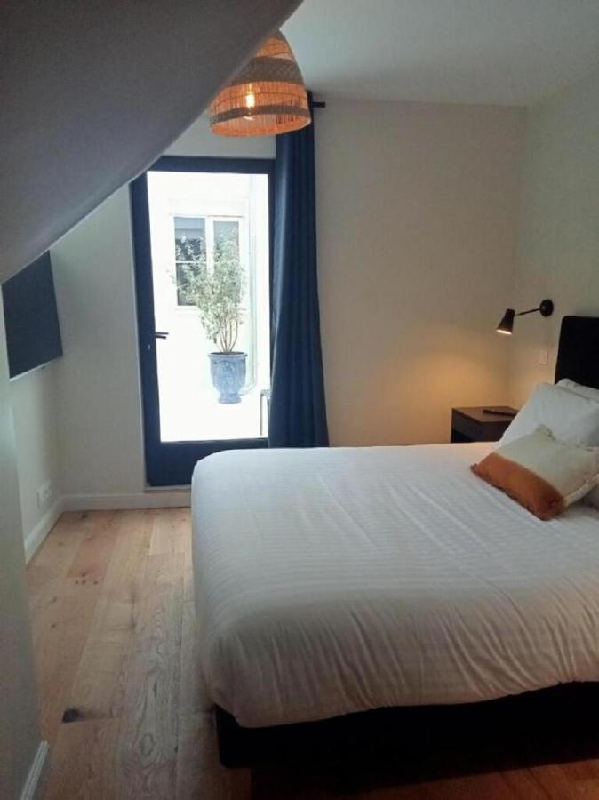 Les Nids Perches - Rue Sainte Croix Apartment มอคตาญ-โอ-แปร์ช ภายนอก รูปภาพ